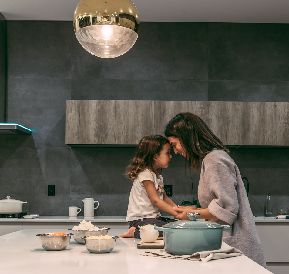 Mother and daughter in a modern contemporary kitchen